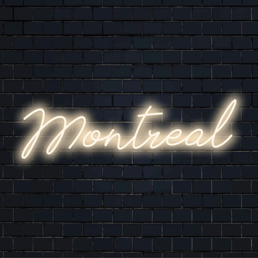 Montreal LED Neon Sign, glowing lettering against black brick wall