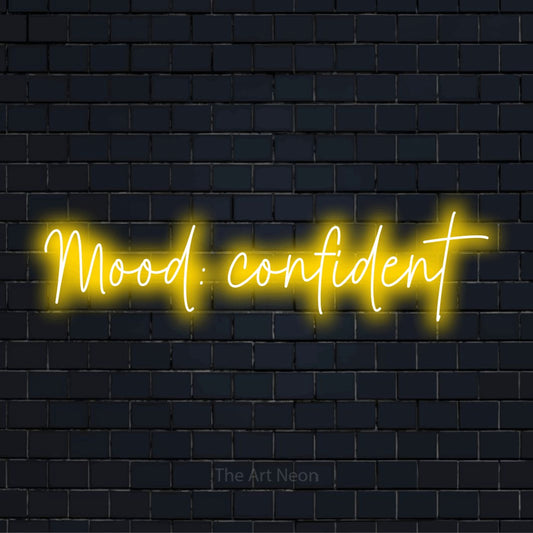 "Mood: Confident" script-style LED neon sign on a black brick wall