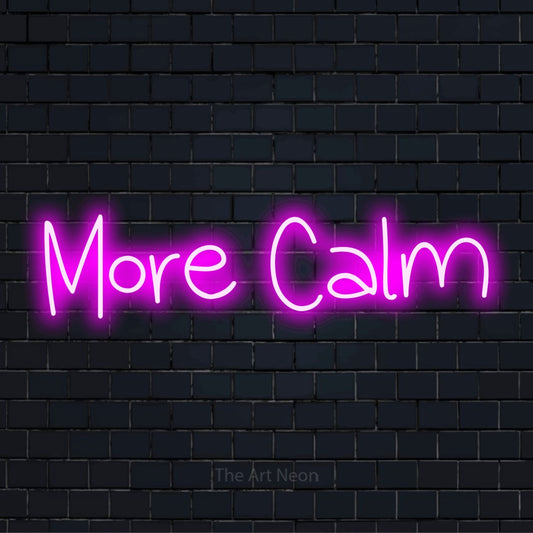 "More Calm" glowing LED neon sign on a black brick wall