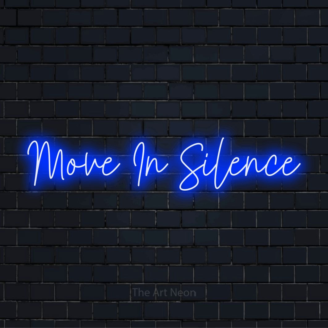 "Move In Silence" LED neon sign on a black brick wall