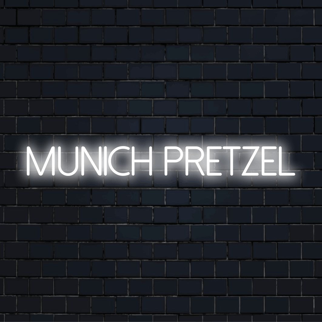 Munich Pretzel Neon Sign, bright neon glow against black brick wall