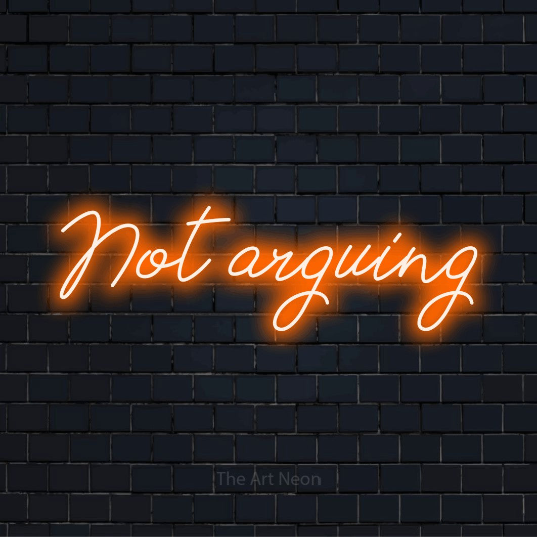 "Not Arguing" neon text design on a black brick wall