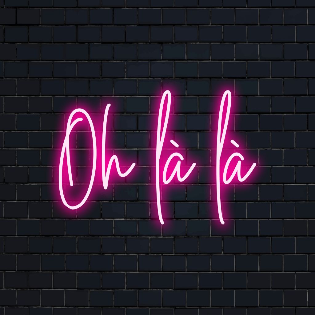 Oh L L LED Neon Sign, bright neon glow against black brick wall
