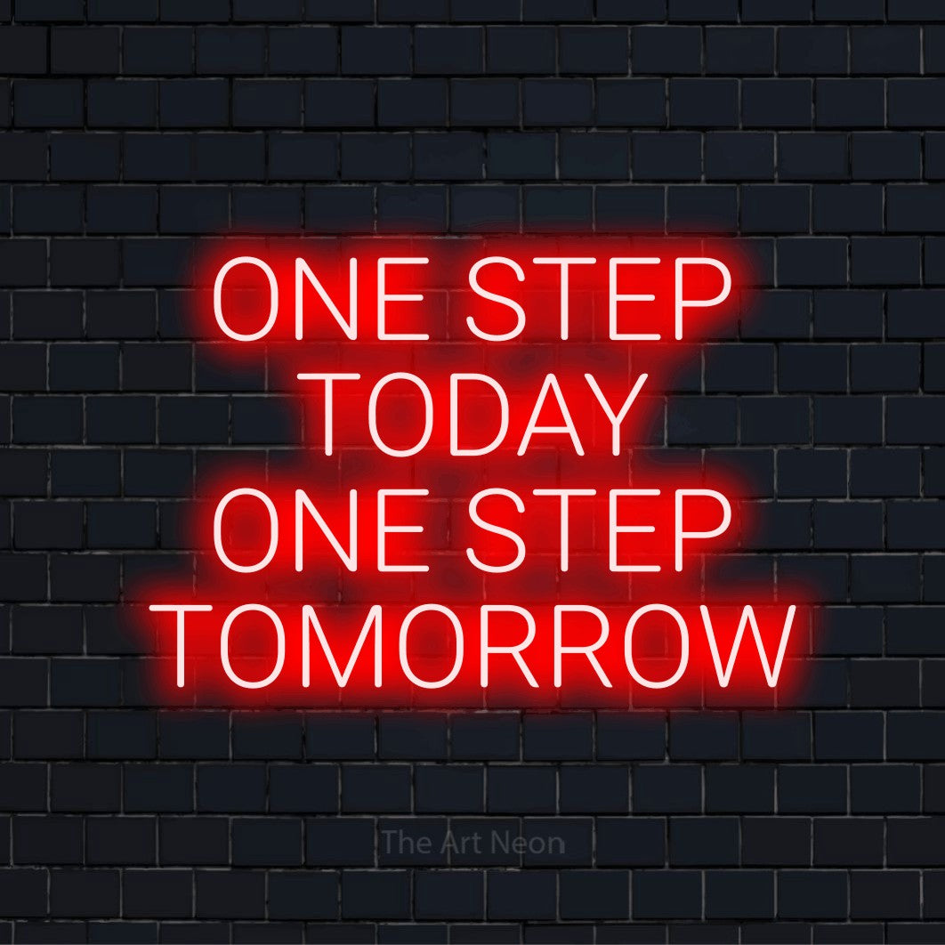 "One Step Today One Step Tomorrow" LED neon sign on a black brick wall