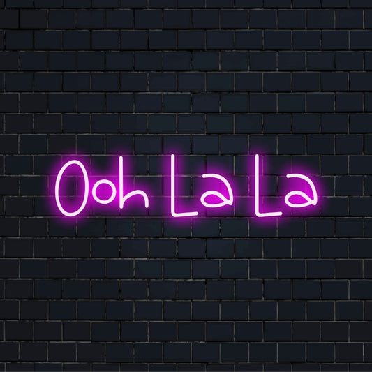 Ooh La La Neon Sign, bright LED glow on dark brick background