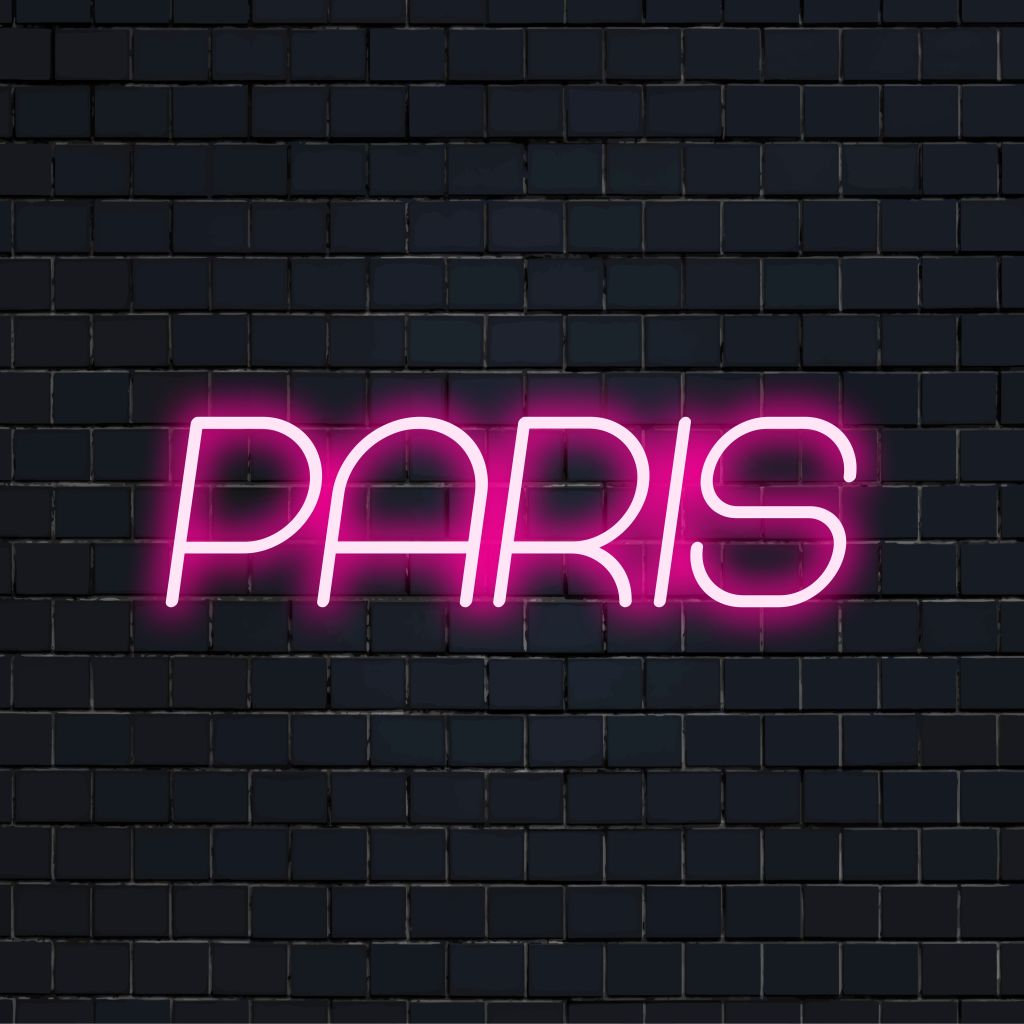 Paris Neon Sign, soft neon glow against brick backdrop
