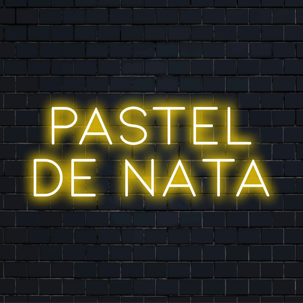 Pastel De Nata Neon Light with glowing neon text on dark brick background