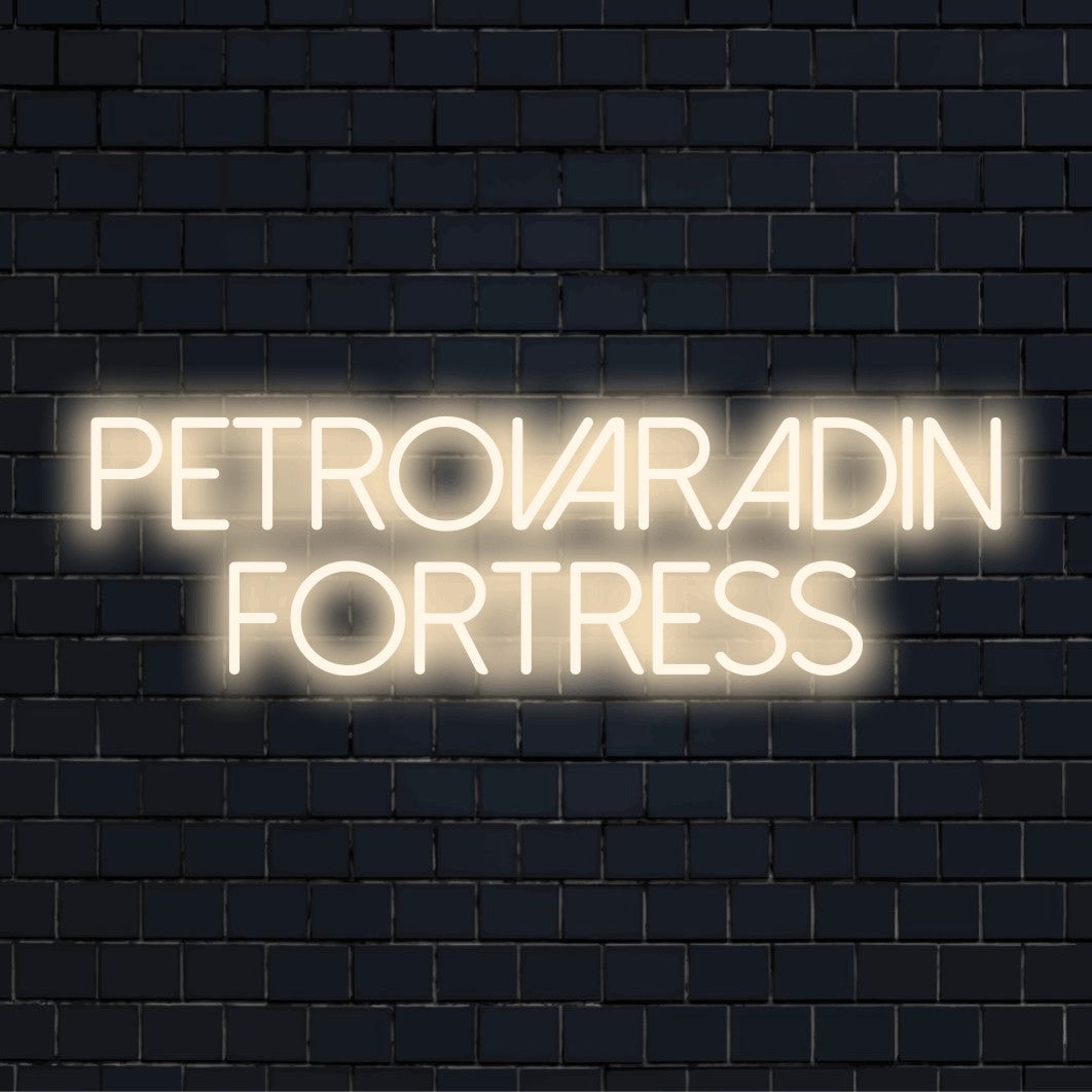 Petrovaradin Fortress Neon Light with glowing wall decor against brick backdrop