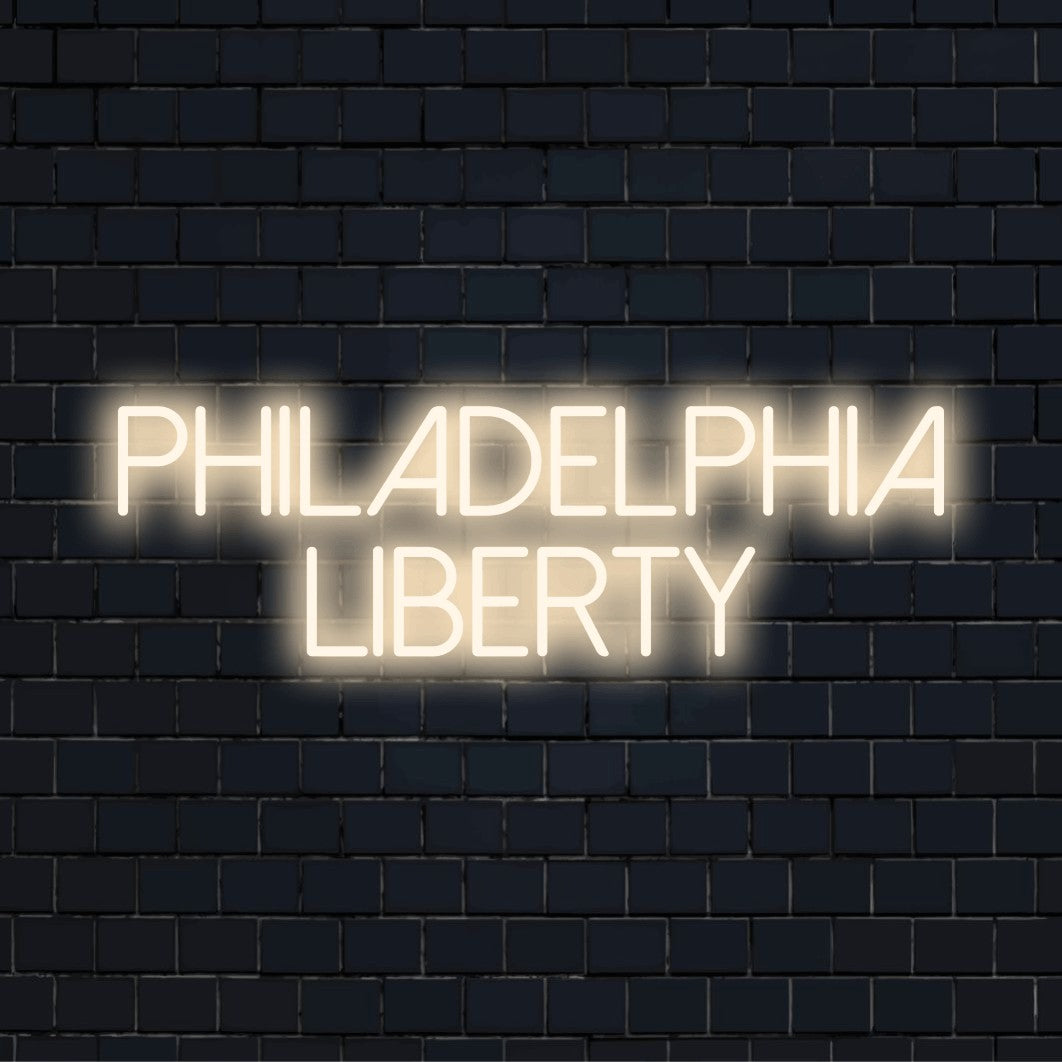 Philadelphia Liberty LED Neon Sign, bright LED glow on black brick background