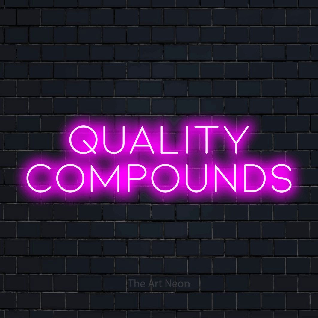 "Quality Compounds" text design with neon effect on a black brick wall