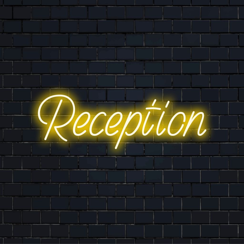 Reception Neon Sign, glowing neon text against black brick wall
