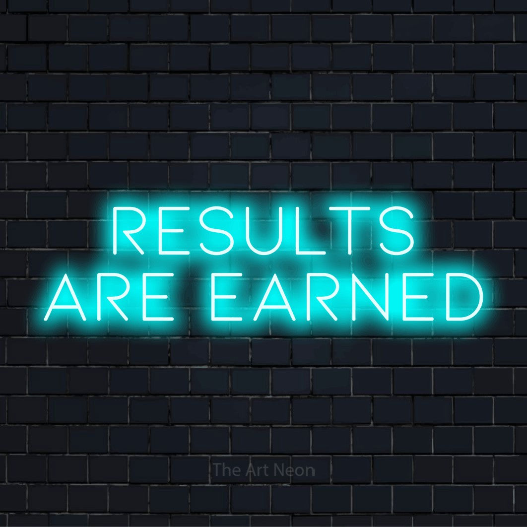 "Results Are Earned" glowing LED neon sign on a black brick wall