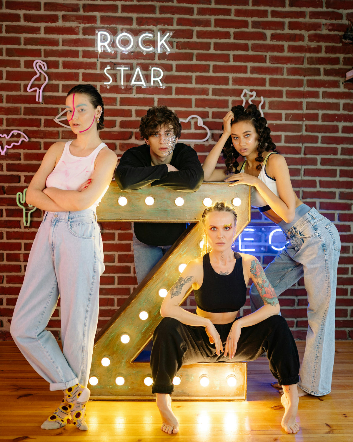 Rock Star LED neon sign photographed with a dance group