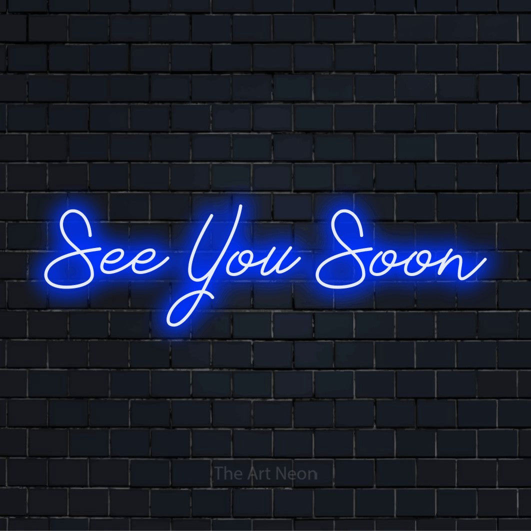 "See You Soon" neon text design on a black brick wall