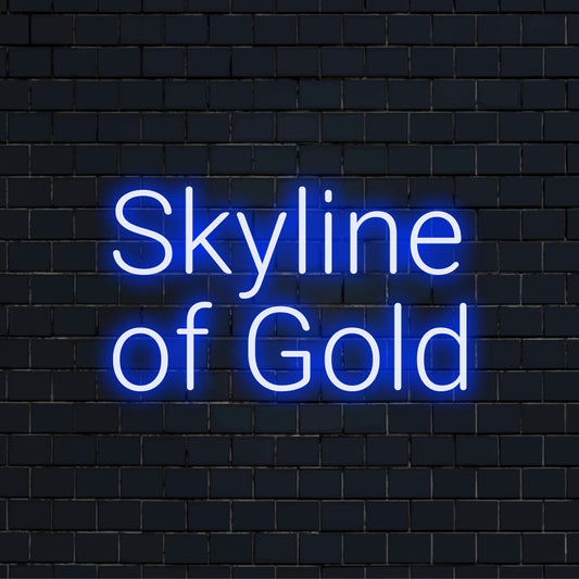Skyline Of Gold Neon Sign, glowing wall decor against brick backdrop