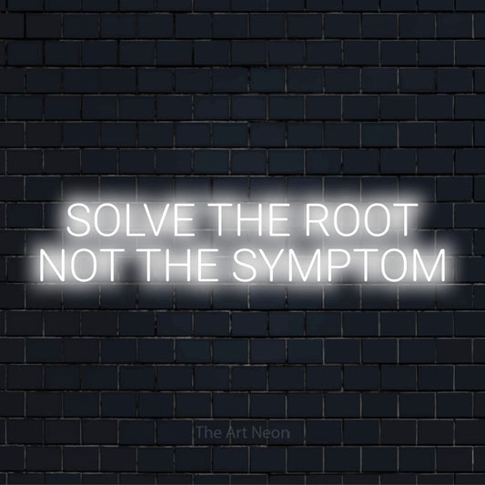 "Solve The Root Not The Symptom" text design with neon effect on a black brick wall