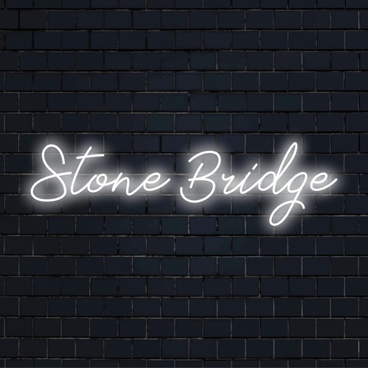 Stone Bridge Neon Sign, glowing neon text on dark brick wall