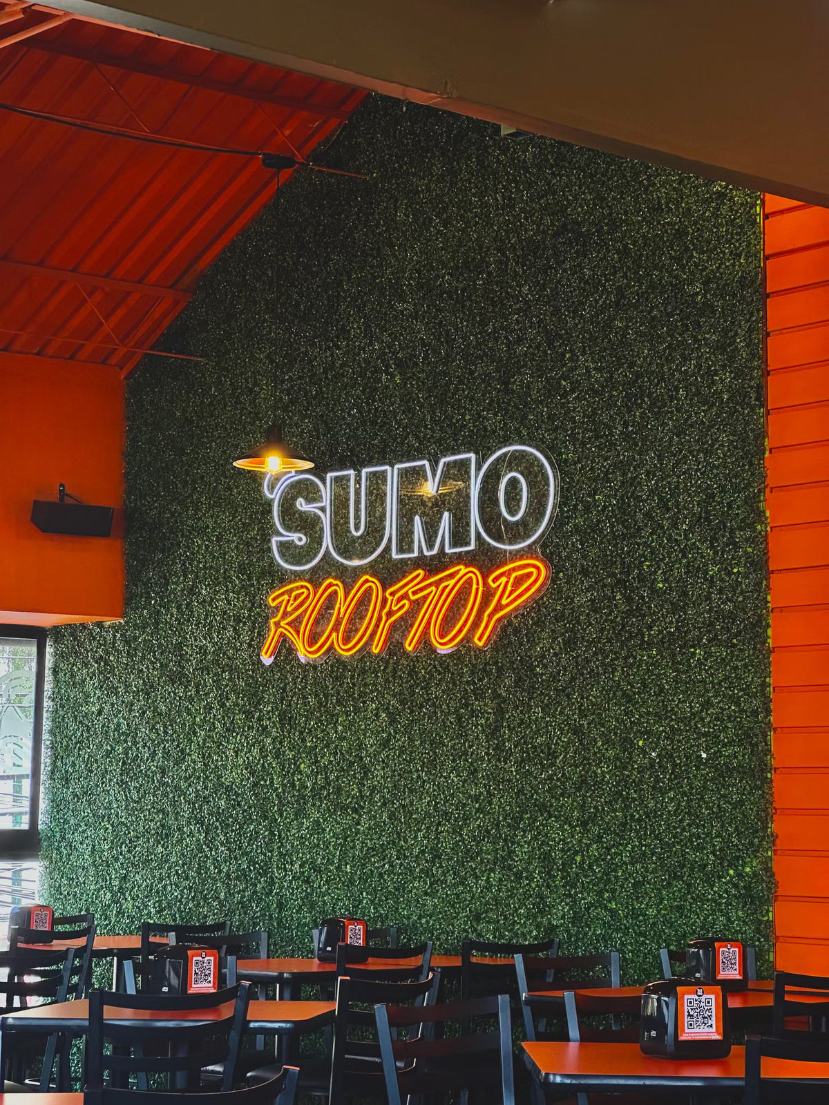SUMO Rooftop custom logo LED neon sign in a restaurant
