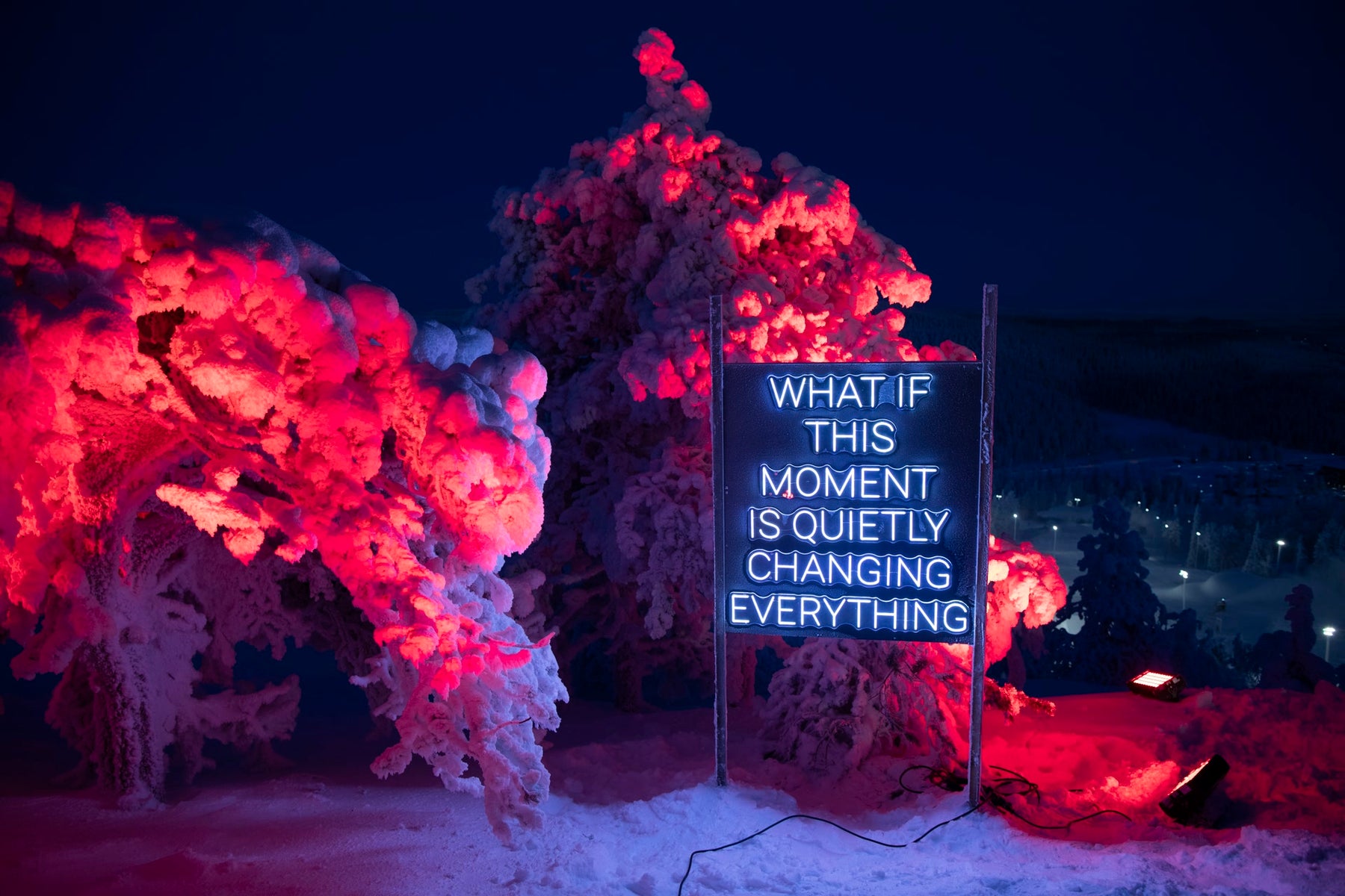 Outdoor LED neon text installation at Ruka Polar Night Light Festival in Finland