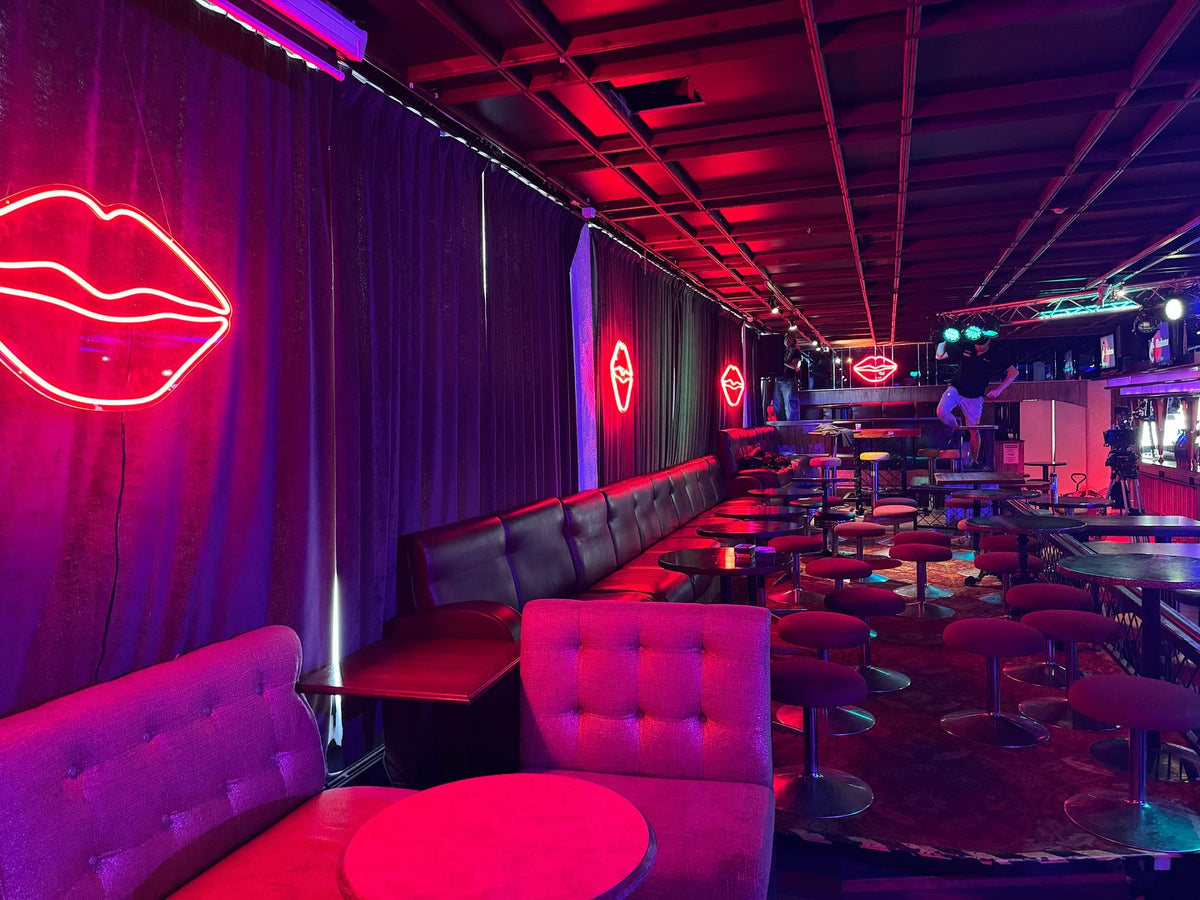 Red lip-shaped LED neon signs used on a Solar Films production set in Finland