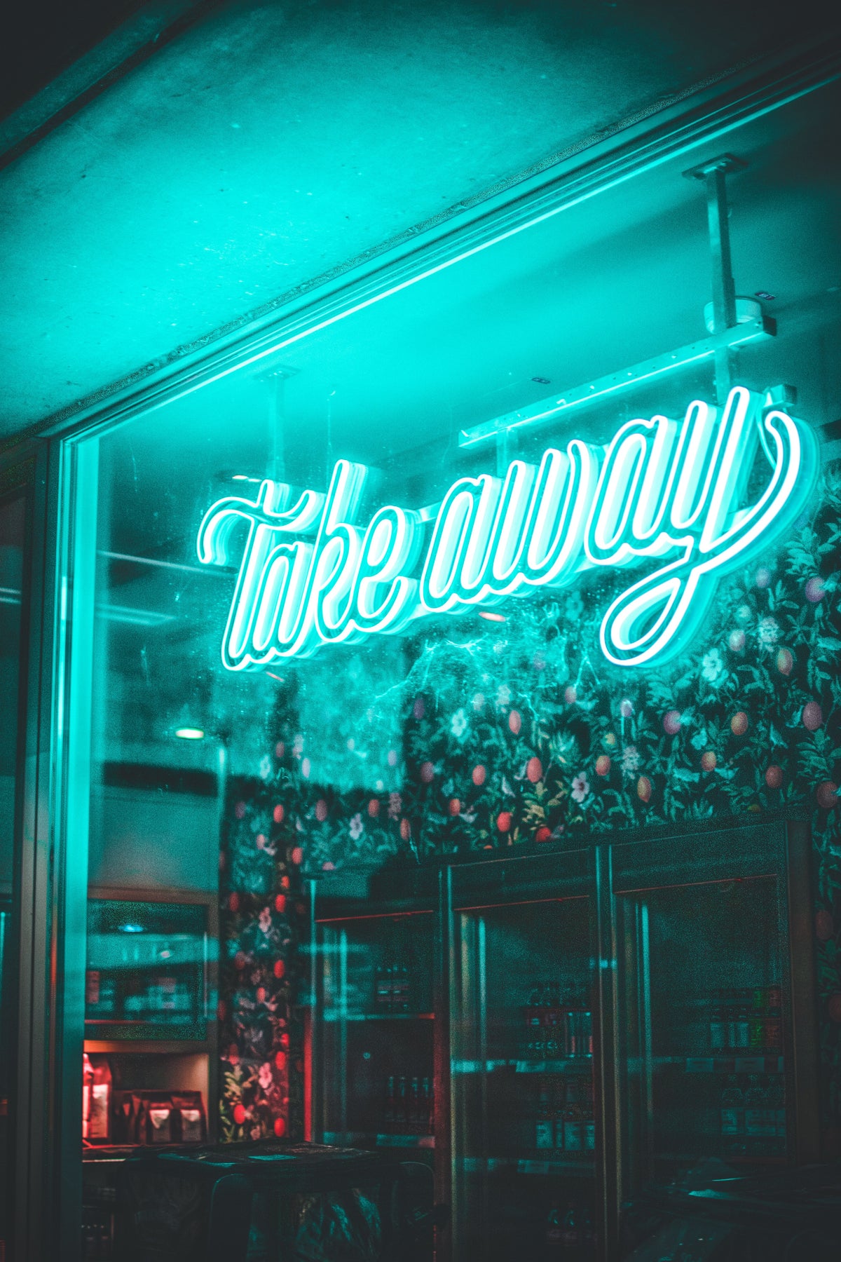 The Jungle custom LED neon logo installed inside a storefront window
