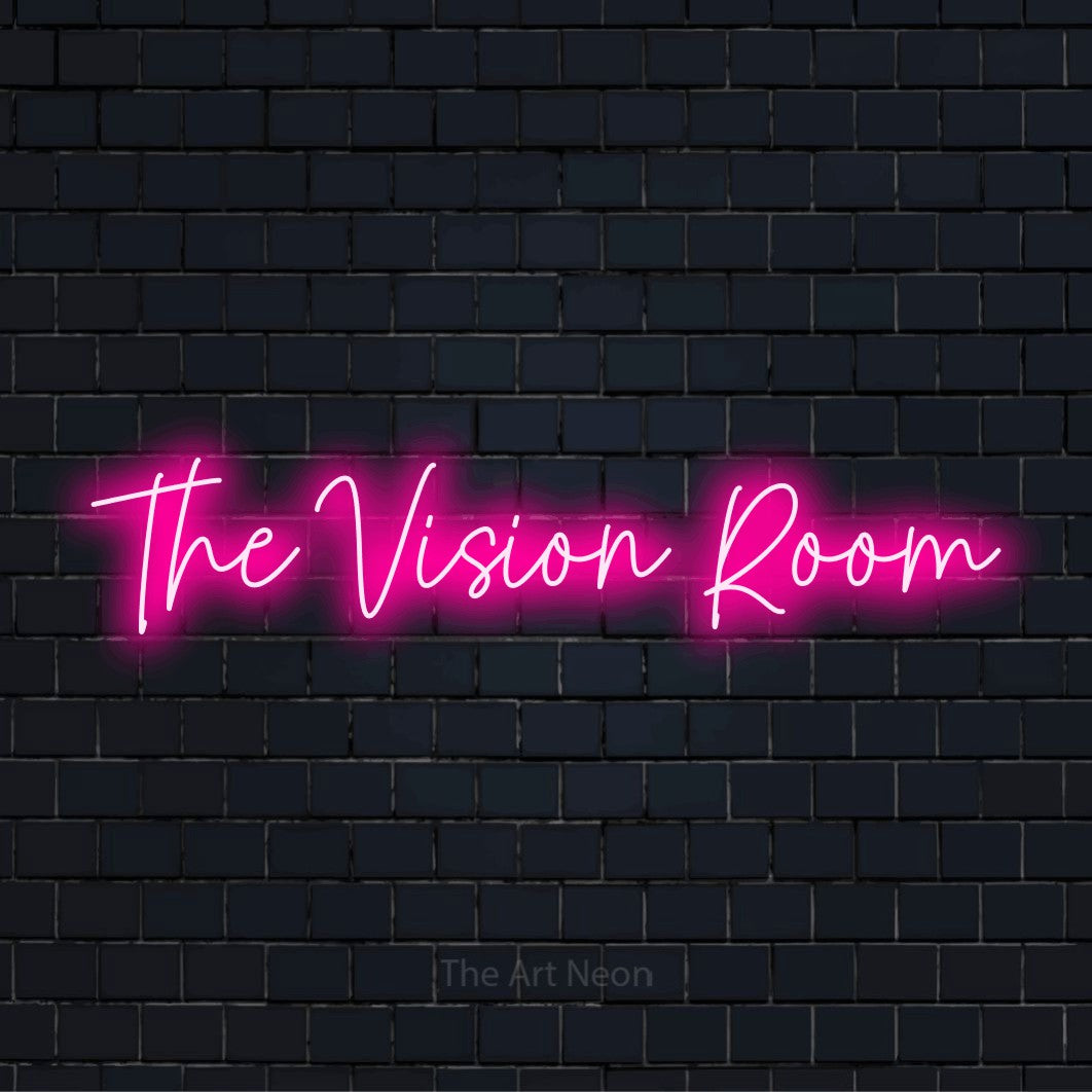"The Vision Room" LED neon sign on a black brick wall