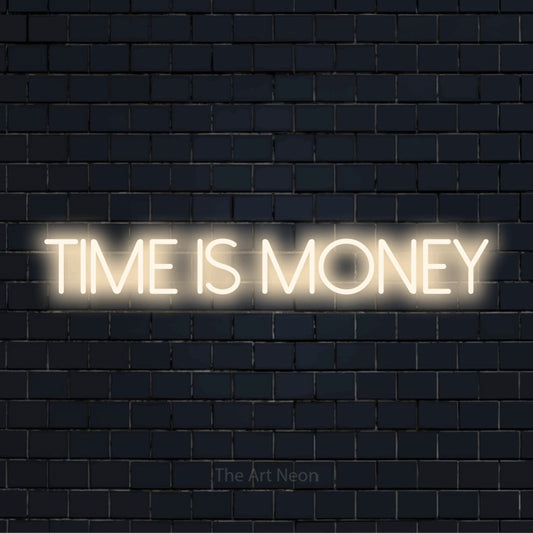 "Time Is Money" script-style LED neon sign on a black brick wall