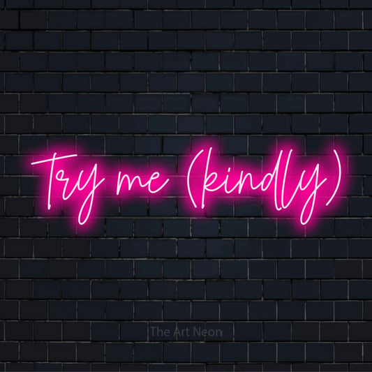 "Try Me (kindly)" LED neon sign on a black brick wall