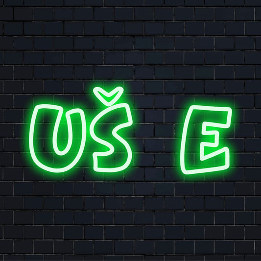 U E LED Neon Sign, bright neon glow against black brick wall