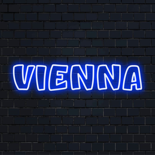 Vienna Neon Sign, neon text light against black brick wall