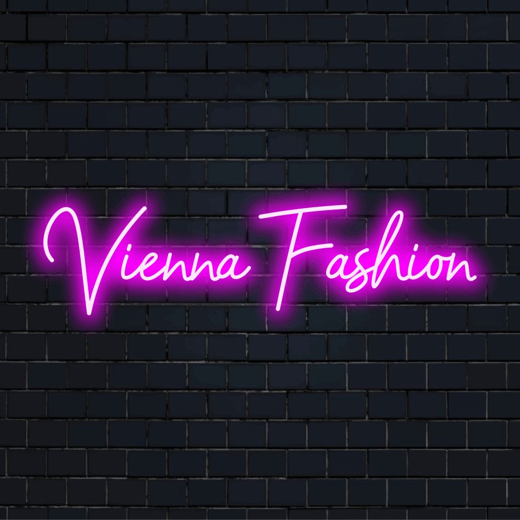 Vienna Fashion LED Neon Sign, soft neon glow on dark brick background