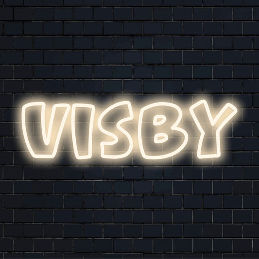 Visby Neon Light with glowing neon text against black brick wall