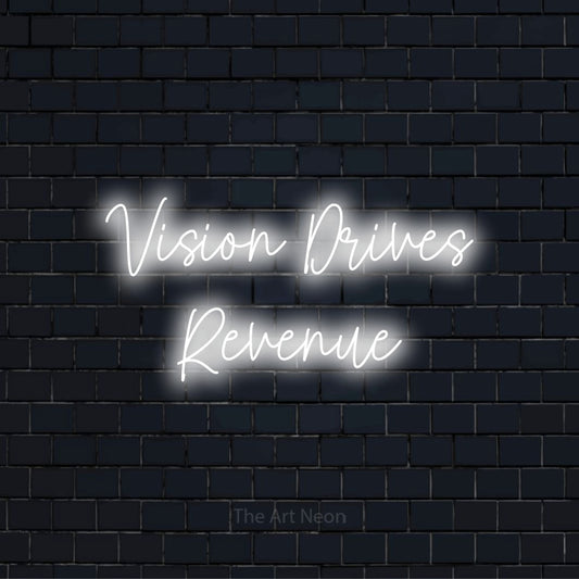 "Vision Drives Revenue" text design with neon effect on a black brick wall