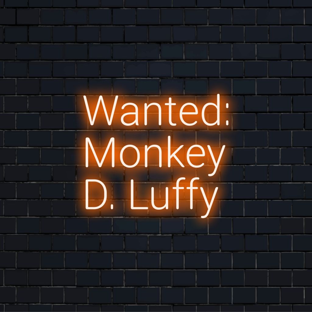 Wanted Monkey D Luffy Neon Light with glowing lettering against black brick wall