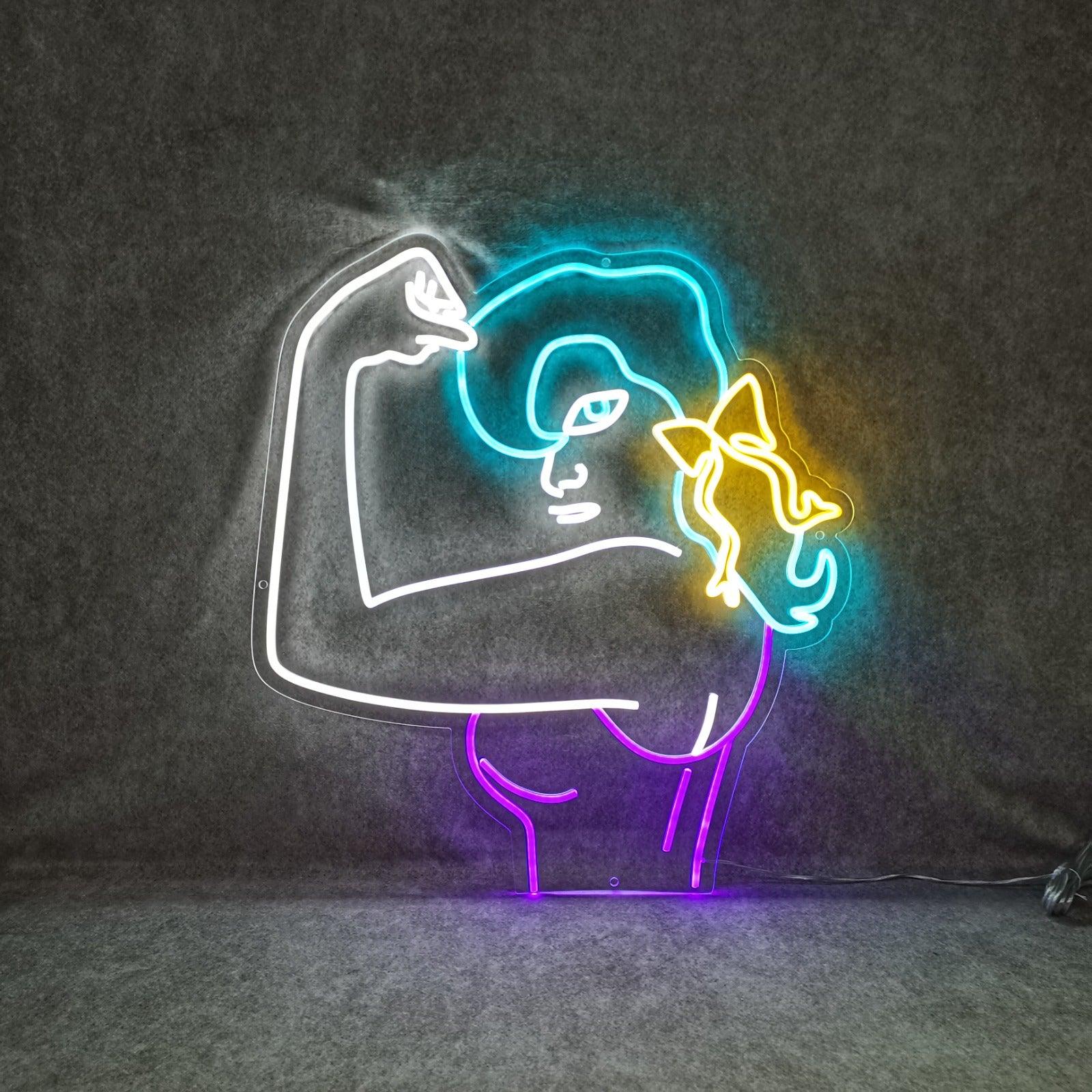An inspiring neon sign showcasing a powerful image of a woman flexing her muscles, symbolizing strength, empowerment, and fitness.
