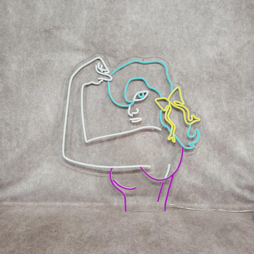 Neonreclame met vrouw die spieren spant - The Art Neon